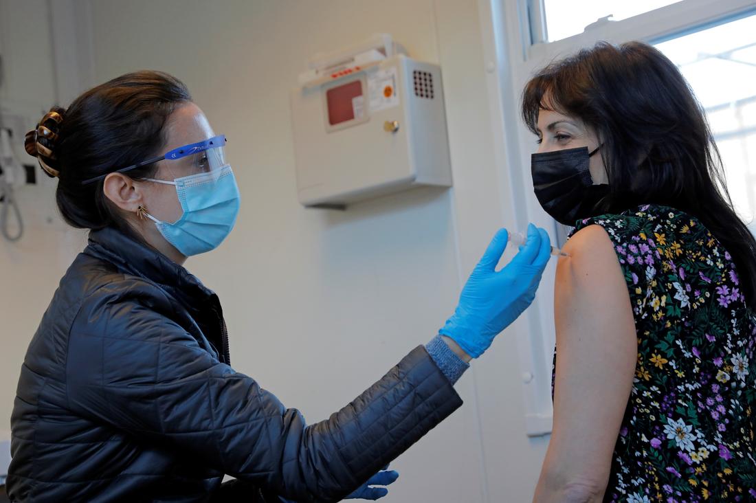 Mass vaccination sites open in New York City as Covid-19 batters U.S.